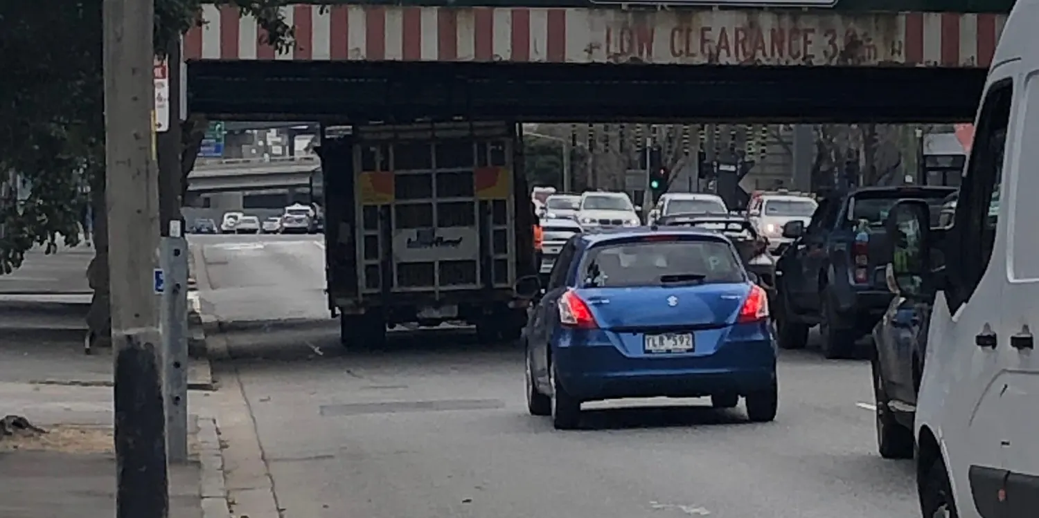 Preposterous Pick-up Plight: Trembling Truck, Terrifying Bridge, and an Excavator's Escapade!